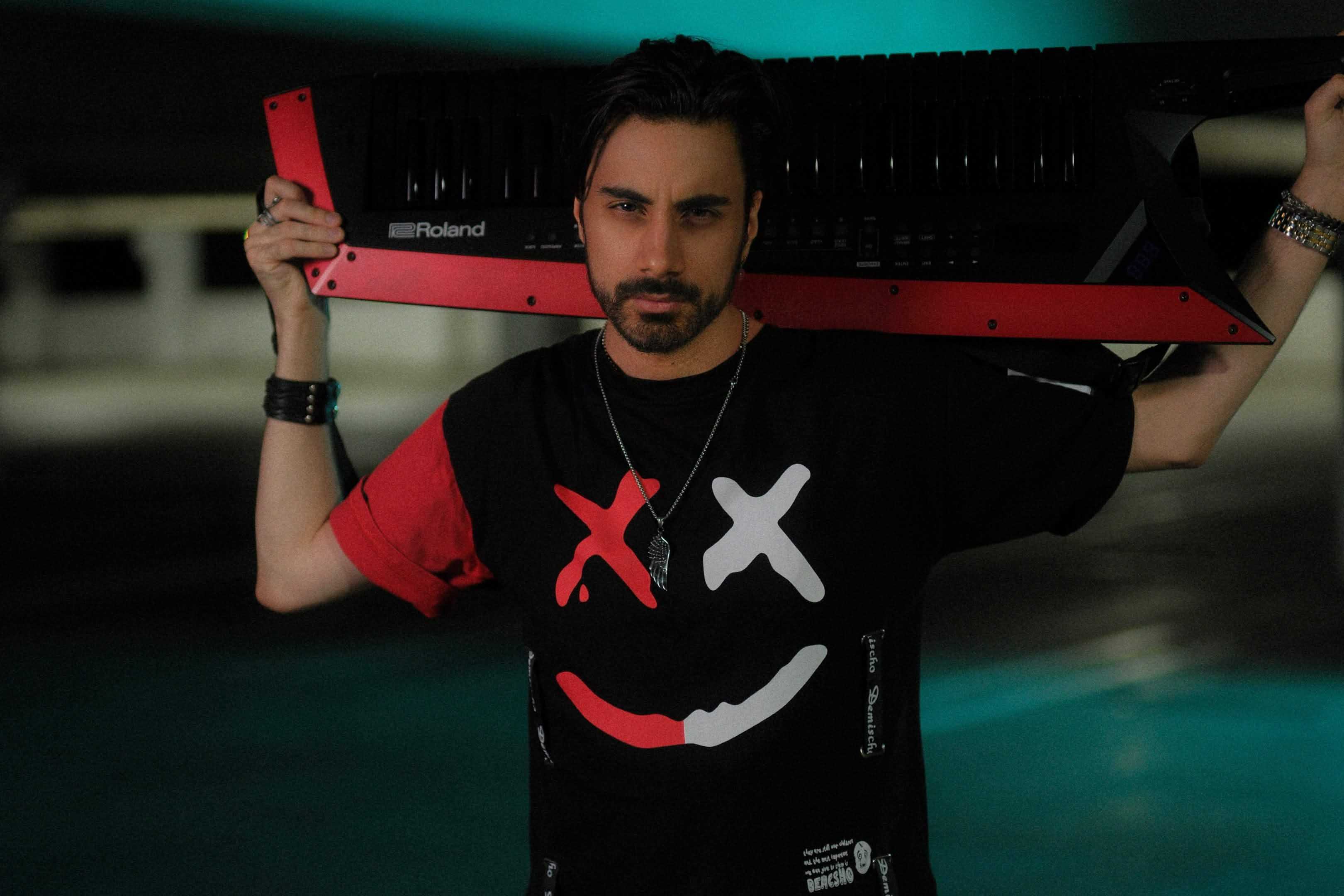 Daniel Michael with keytar behind him